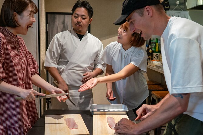 Tokyo: Japanese Knife Skills and Sashimi & Tempura Cooking Class - Preparing tempura alongside the sashimi
