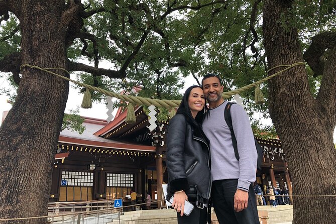 Tokyo Private Cherry Blossom Tour with a Local – Picnic Included - Senso-ji with blossoms and temple roofs