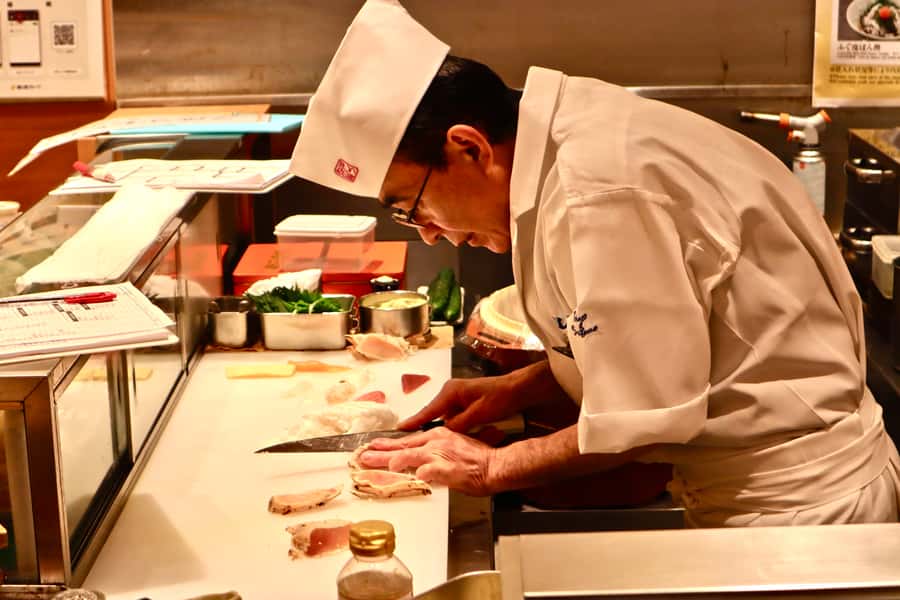 Tokyo: Secret Food Walking Tour - Starting with sushi outside JR Ueno Station