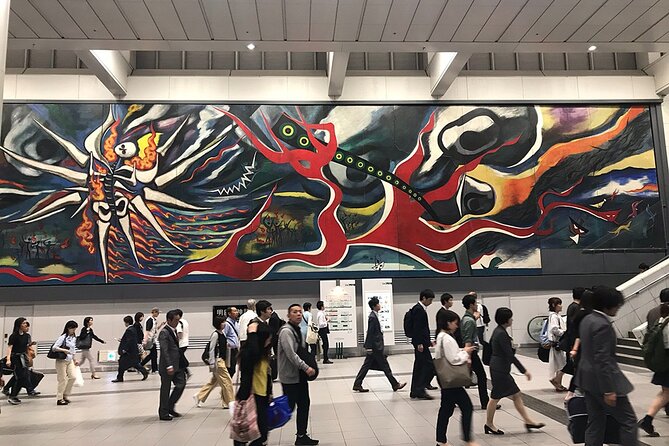 Tokyo Shibuya Crossing & Hidden Streets Walking Tour - Myth of Tomorrow gives the walk a serious beginning