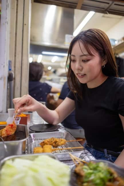 Tokyo: Shibuya Food Tour, Neon Lights & Local Flavors - Shibuya Crossing, then convenience-store favorites