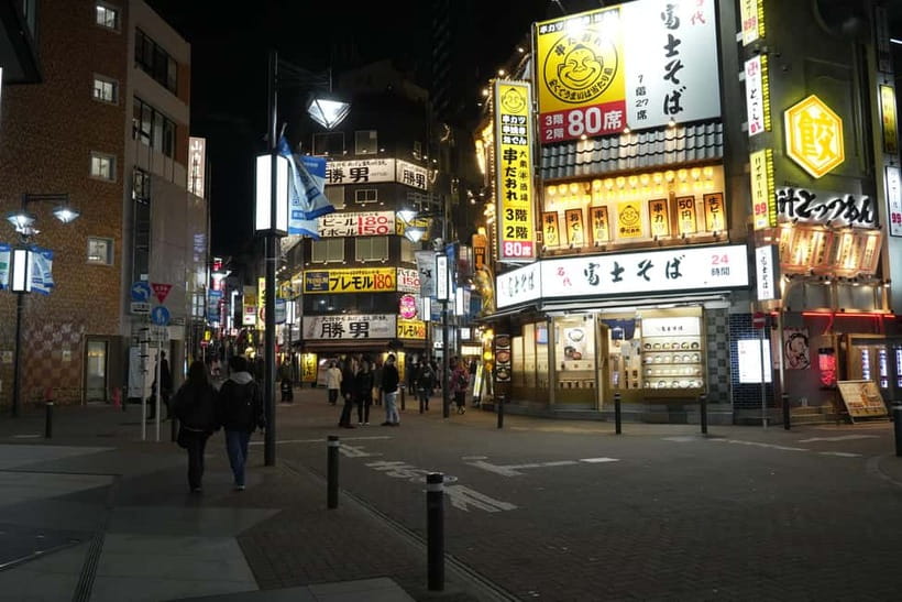 Tokyo: Shibuya Food Tour, Neon Lights & Local Flavors - Don Quijote is sensory overload in the best way