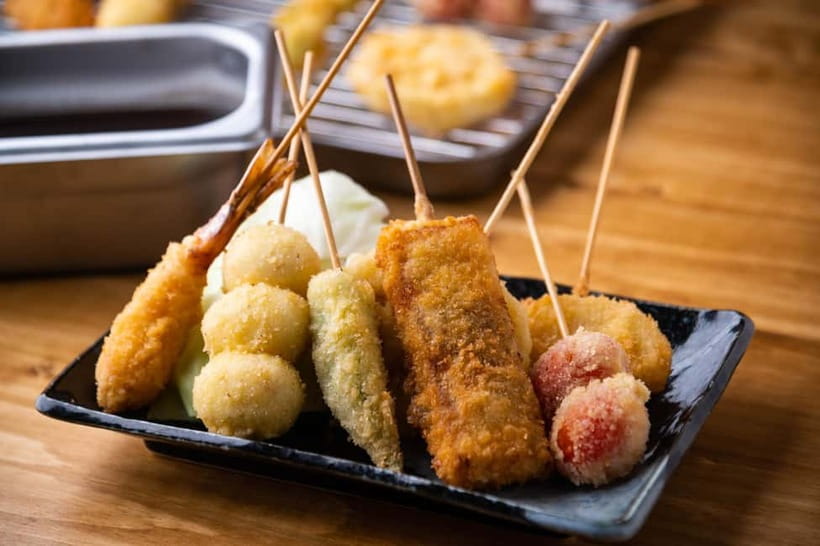 Tokyo: Shibuya Food Tour, Neon Lights & Local Flavors - Miyashita Park offers a calmer first look