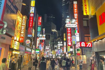 Tokyo: Shibuya Highlights Walking Tour - Walking through the world-famous scramble