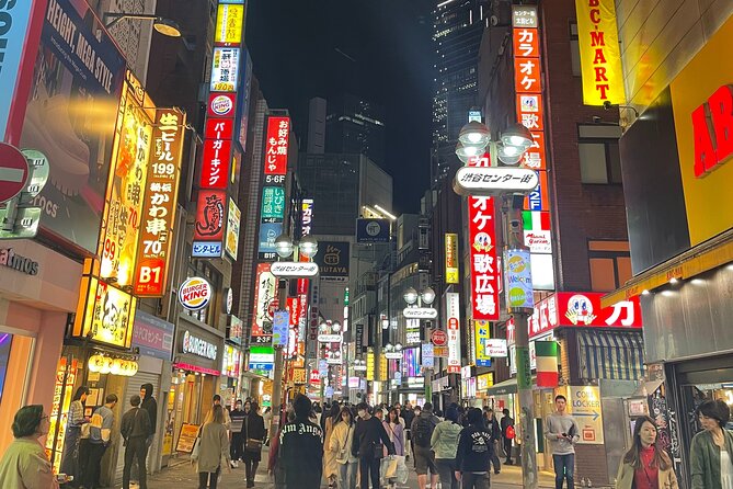 Tokyo: Shibuya Highlights Walking Tour - Walking through the world-famous scramble