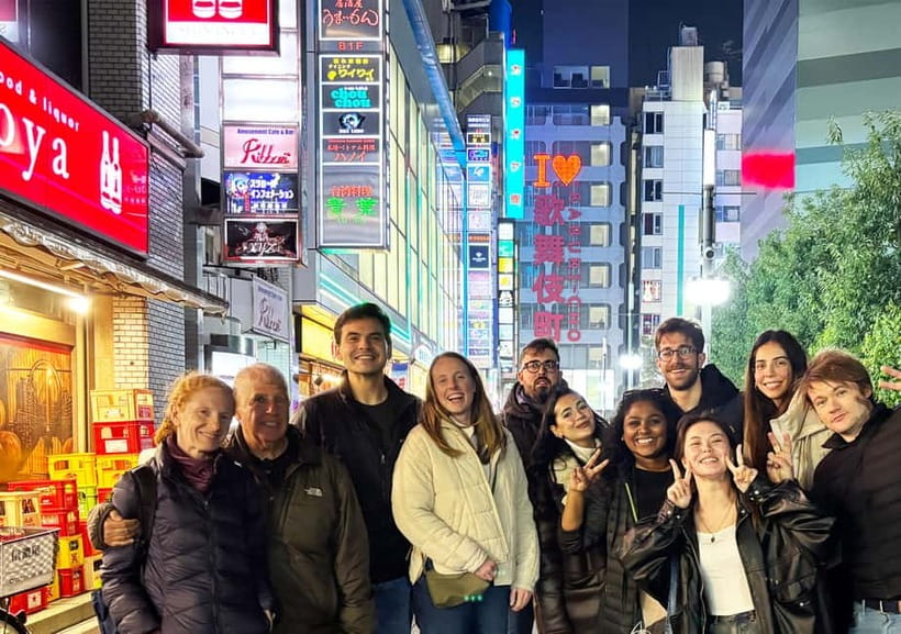 Tokyo: Shinjuku Bar Hopping & Karaoke Night Tour - Walking through Kabukicho’s neon streets