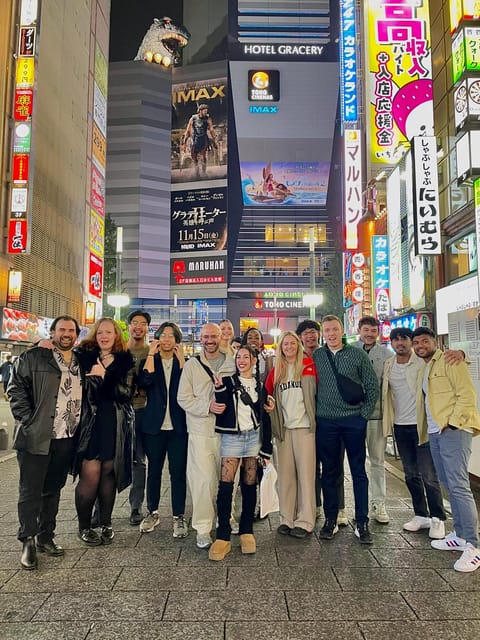 Tokyo: Shinjuku Local Bar and Izakaya Guided Walking Tour - Walking through Kabukicho after dark