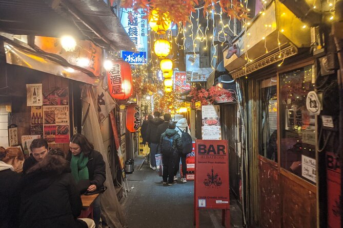 Tokyo Shinjuku Night Tour with Pachinko Gaming Experience - Shinjuku after dark, away from the main signs