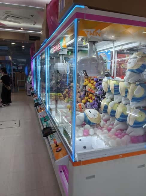Tokyo Shinjuku : Private Walking Night Tour with Pachinko - Finding the Lion statue at Shinjuku East Exit