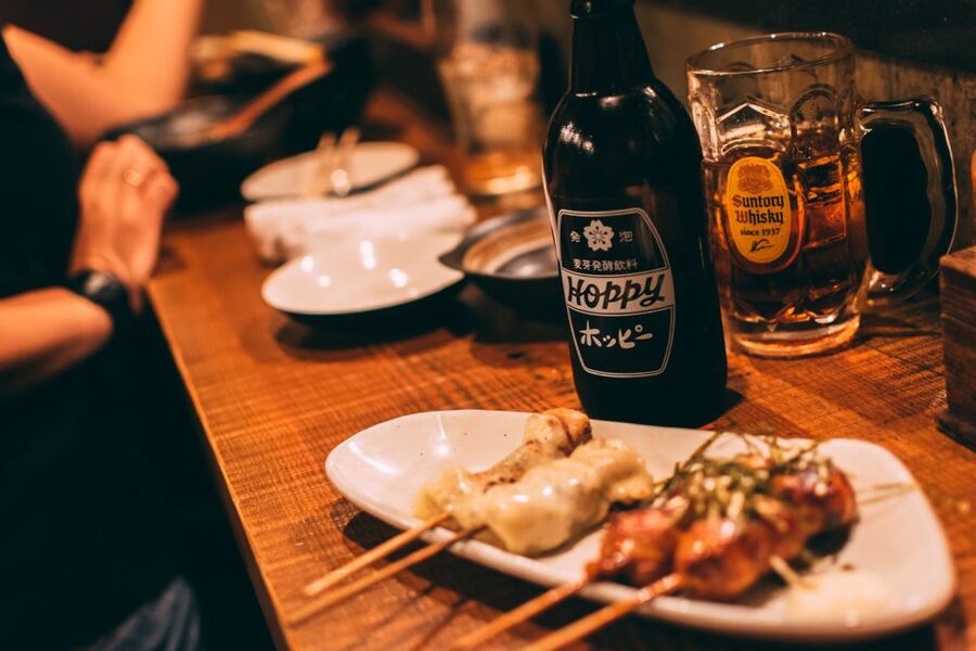 Tokyo: The Best of Izakaya in Shinjuku Food & Cultural Tour - Kabukicho and Omoide Yokocho between the plates