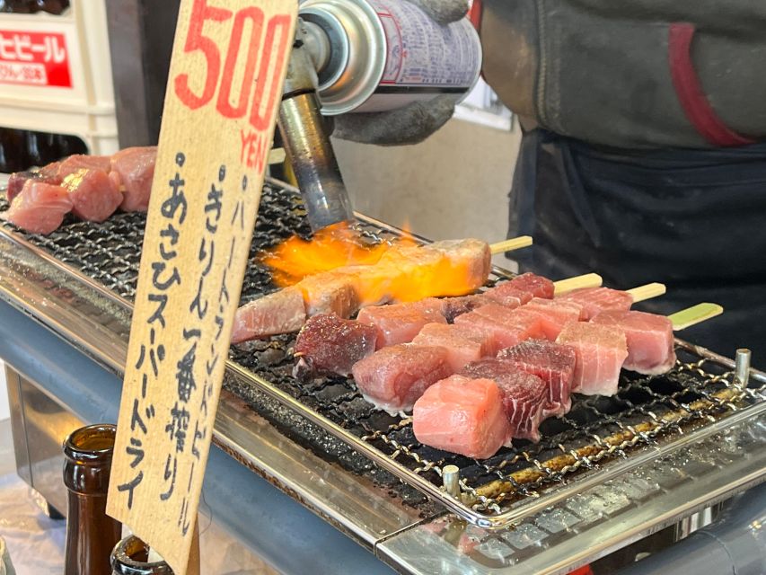 Tokyo: Tsukiji Fish Market Tour with 6 Stops & Seafood Lunch - Sitting down to a seafood donburi lunch