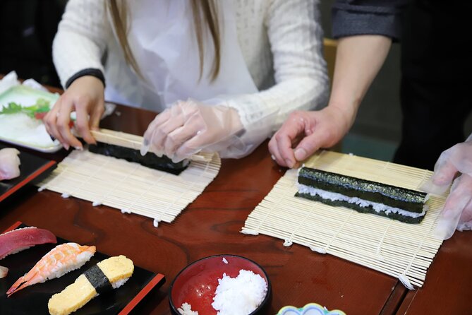 Tsukiji Fish Market Guided Tour and Sushi Making with Pro Chef - From Tsukiji Honganji to the market lanes