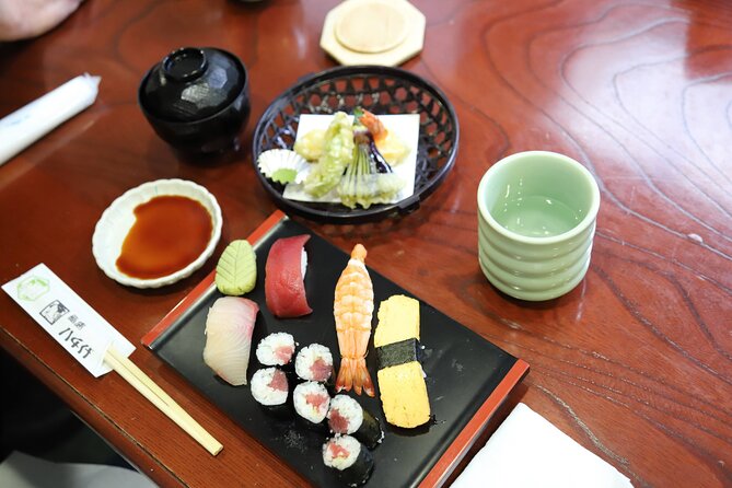 Tsukiji Fish Market Guided Tour and Sushi Making with Pro Chef - Price, group size, and what is included