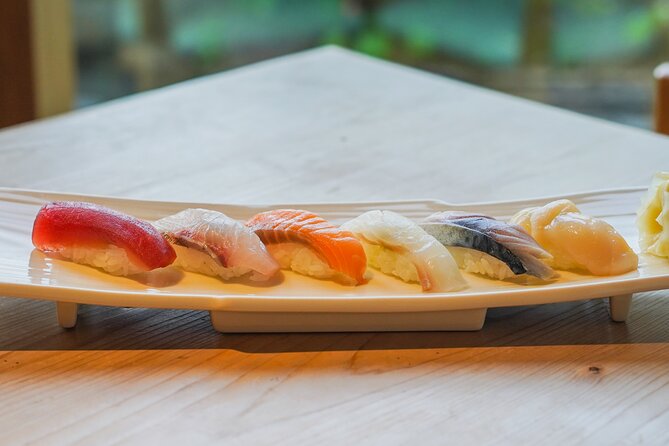 Vegan Friendly Sushi & Okonomiyaki Shibuya Night Foodie Tour - Walking through Center-gai and old Shibuya